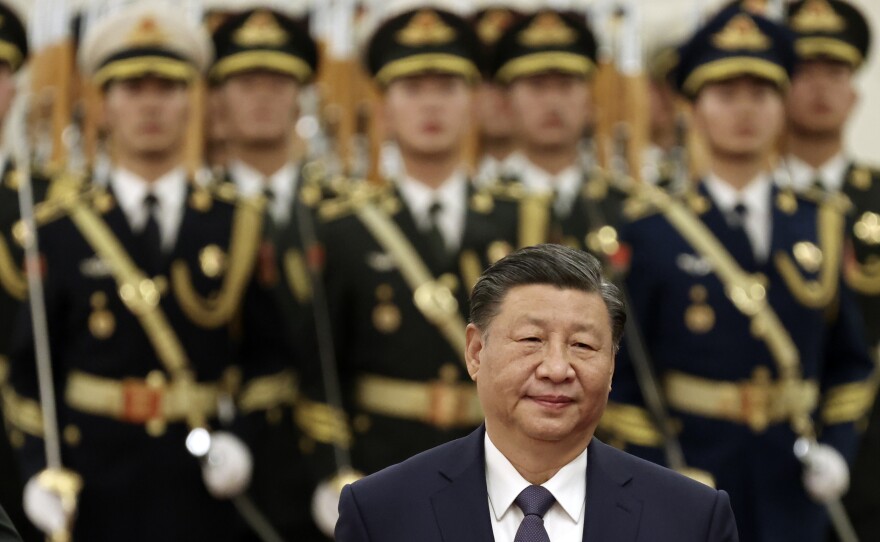 Chinese leader Xi Jinping reviews the honor guard at the Great Hall of the People in November in Beijing.