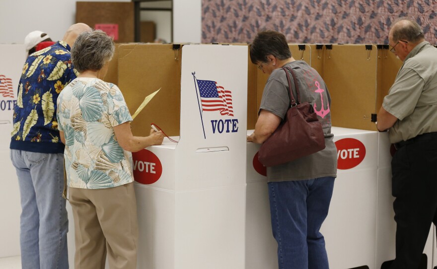 Voters participate in early voting this past June at the Oklahoma County Elections Board in Oklahoma City.