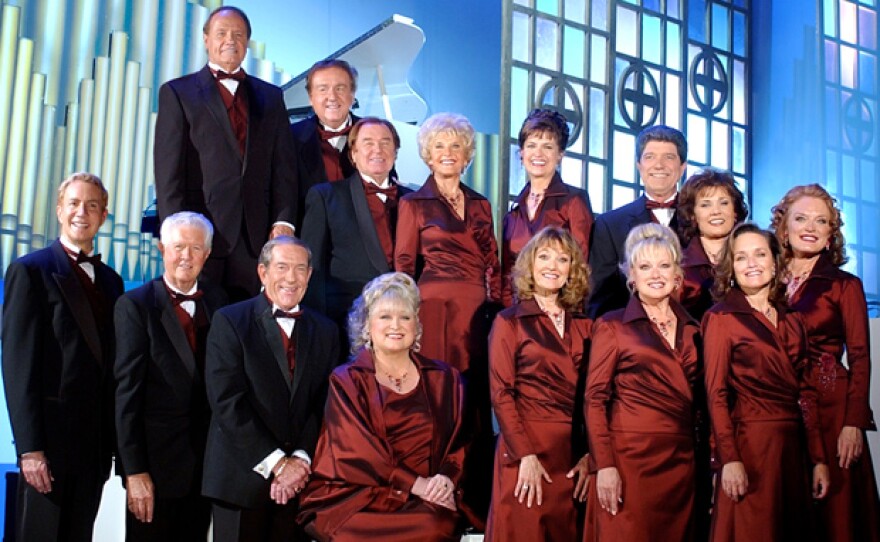 The cast of "Lawrence Welk Precious Memories" gathers for an official group photo. (bottom row, left to right): Tom Netherton, Dick Dale, Jack Imel, Jo Ann Castle, Kathy Lennon, Janet Lennon, Mimi Lennon. (back row, left to right): Ken Delo, Bob Ralston, Joe Feeney, Norma Zimmer, Mary Lou Metzger, Guy Hovis, Ralna English and Gail Farrell.