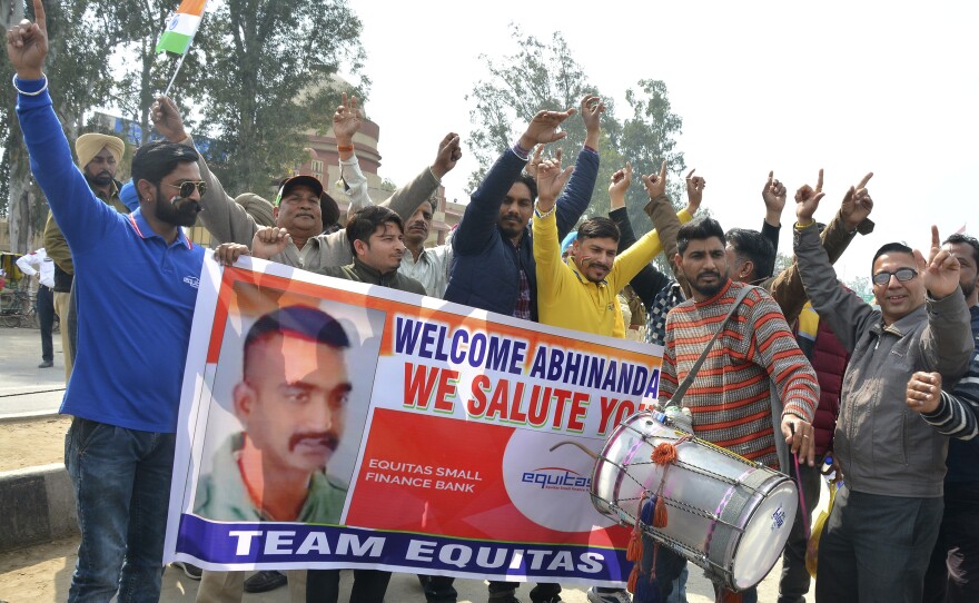 Indians dance as they wait to welcome Indian fighter pilot Abhinandan Varthaman at the Wagah border post with Pakistan, 17.5 miles from Amritsar, India.