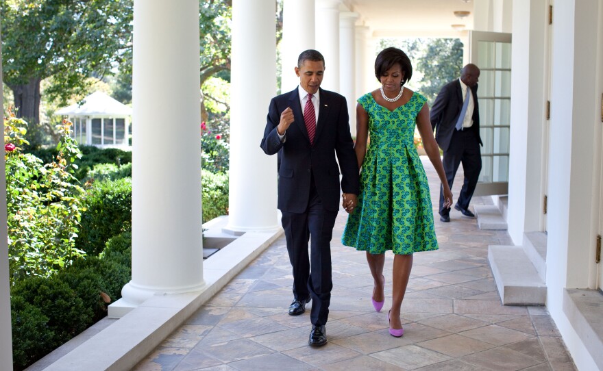 President Obama and First Lady Michelle Obama walk along the Colonnade of the White House on Sept. 21, 2010. Michelle's fashion choices have influenced designers' profits.
