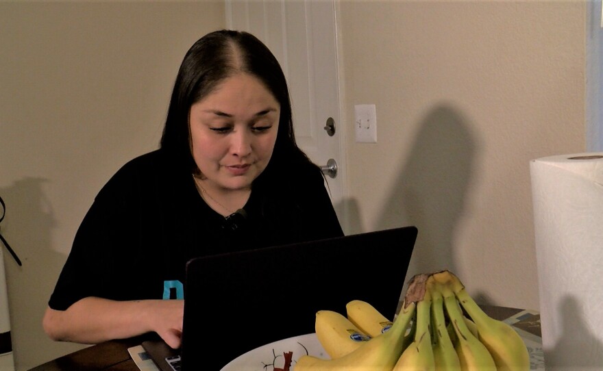 Brenda Martinez at home studying online for classes to become a drug and alcohol counselor, December 15, 2021