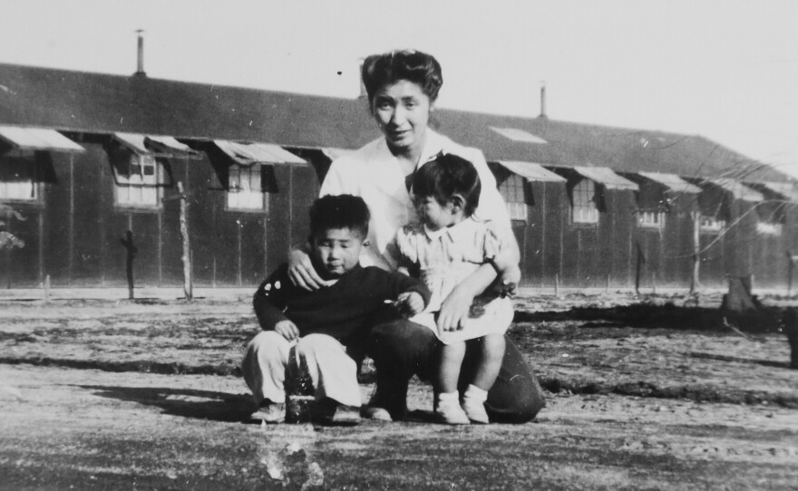 This 1945 photo provided by the family shows Shizuko Ina, with her son Kiyoshi (left) and daughter Satsuki in an internment camp in Tule Lake, Calif. This photograph was taken by a family friend who was a soldier at the time, since cameras were considered contraband at the camp. Satsuki was born at the camp.
