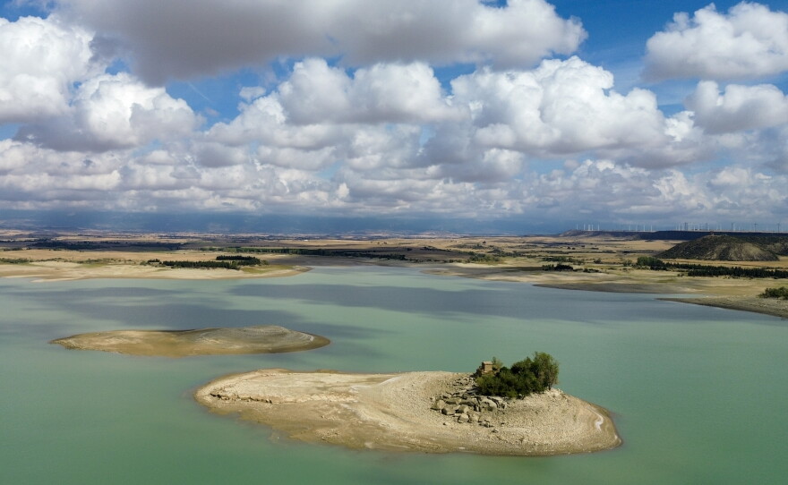 The Sotonera reservoir, which serves population centers and farms in the provinces of Huesca and Zaragoza, is seen in Tormos, Spain, on Sept. 29. This is one of Spain's driest regions that, with climate change, is already suffering from repeated drought.
