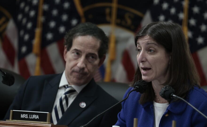 Rep. Jamie Raskin, D-Md., listens as Rep. Elaine Luria, D-Va., speaks during a business meeting with the select committee investigating the Jan. 6 attack, on Capitol Hill on Dec. 13, 2021. The committee is looking into who funded the rally and other events preceding the deadly attack.