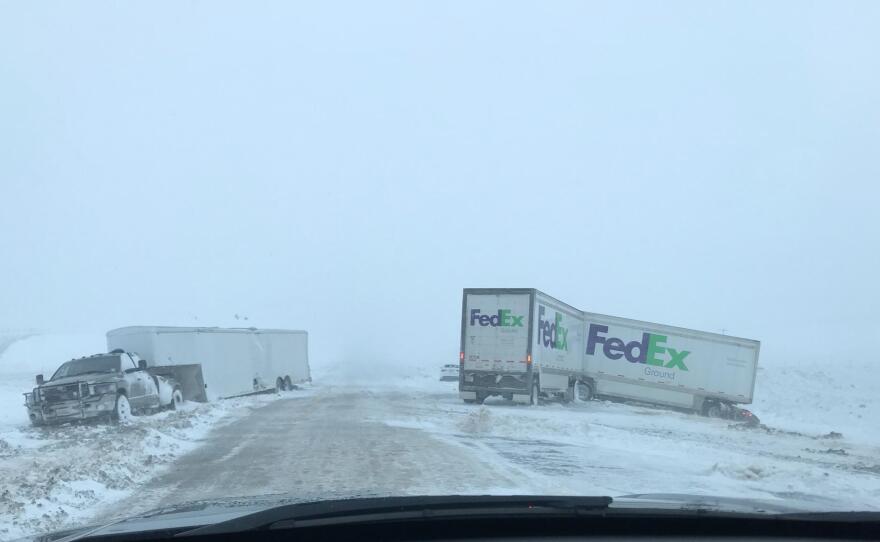 A photo provided by Nebraska State Patrol shows stranded motorists including several trucks on Interstate 80 near Sidney, Neb. on Friday.