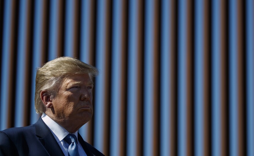 President Trump tours a section of the southern border wall in 2019, in Otay Mesa, Calif.