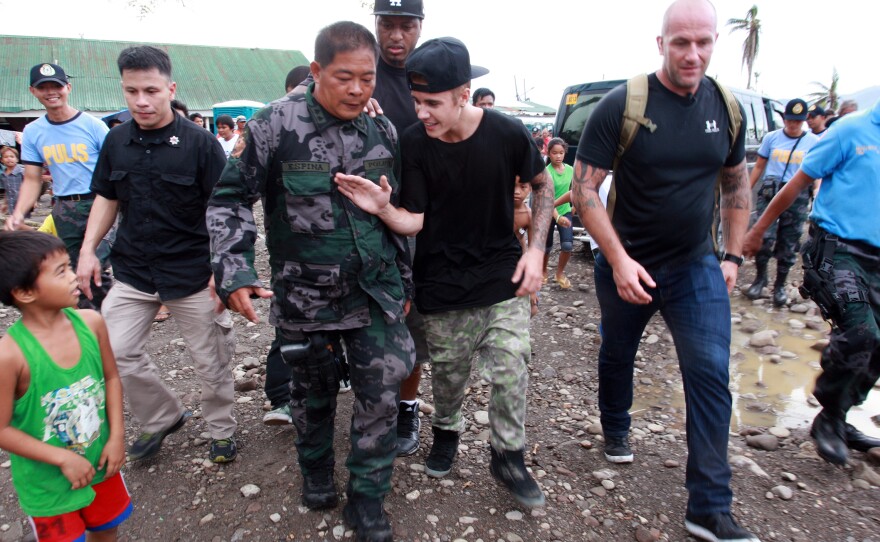 Justin Bieber may have a bad boy side, but the angelic Bieber launched a campaign to raise money for victims of Typhoon Haiyan, which struck the Philippines last year. Here, he visits a Filipino elementary school. And he took the Ice Bucket Challenge — twice. And urged Beliebers to do the same.