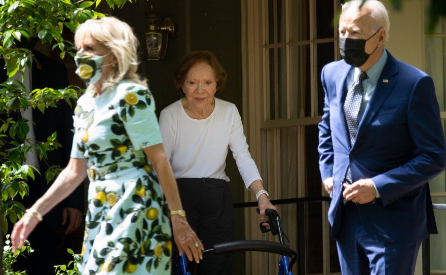 Rosalynn Carter walks President Biden and first lady Jill Biden out after they visited former President Jimmy Carter in April 2021 in Plains, Ga.