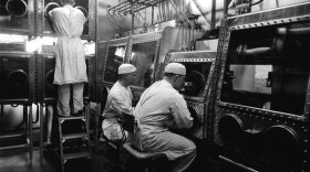 At Camp Detrick, Maryland, researchers used gas masks and Class III biological safety cabinets to protect themselves from deadly microbial agents such as anthrax. American Experience premieres The Living Weapon, an unprecedented look inside the race to develop a new weapon of mass destruction.