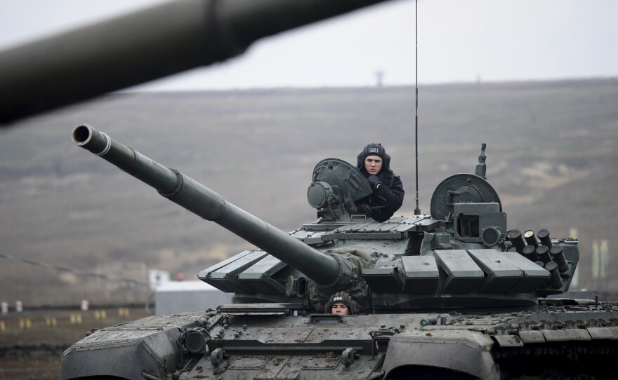 Russian troops take part in drills at the Kadamovskiy firing range in the Rostov region in southern Russia on Dec. 14, 2021. Tensions between the two countries rose in recent weeks amid reports of a Russian troop buildup near the border that stoked fears of a possible invasion — allegations Moscow denied and in turn blamed Ukraine for its own military buildup in the east of the country.