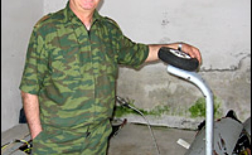 Abkhazia's deputy defense minister, Zakhan Namba, displays what he says is an Israeli-made Georgian unmanned reconnaissance plane that his forces shot down on May 12. Abkaz officials say spy drone flights are a serious provocation.