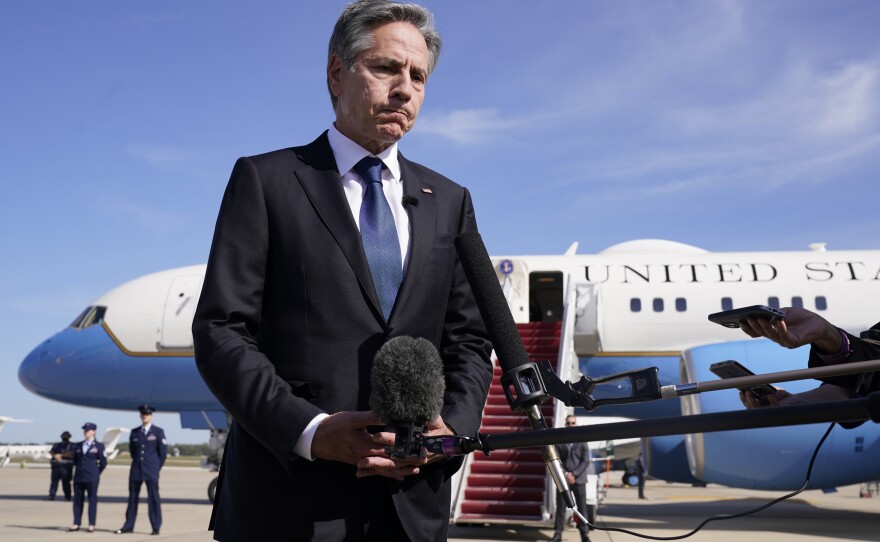 Secretary of State Antony Blinken speaks before boarding a plane, Wednesday, Oct. 11, 2023, at Andrews Air Force Base, Md., en route to Israel. 