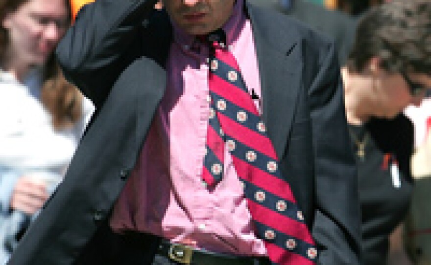 Mourners leave a memorial service for Kevin Granata, a professor of engineering science and mechanics at Virginia Tech killed in Monday's attacks.