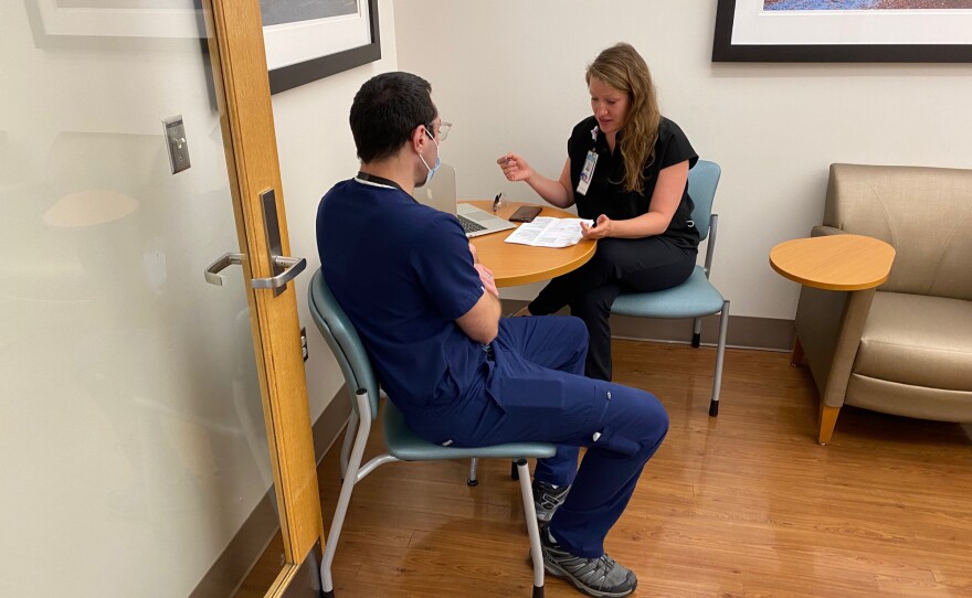 Dr. Riah Patterson, a specialist in perinatal psychiatry, discusses patients and treatment plans with her trainee, a 3rd year psychiatry resident at the Center for Women's Mood Disorders at UNC-Chapel Hill.