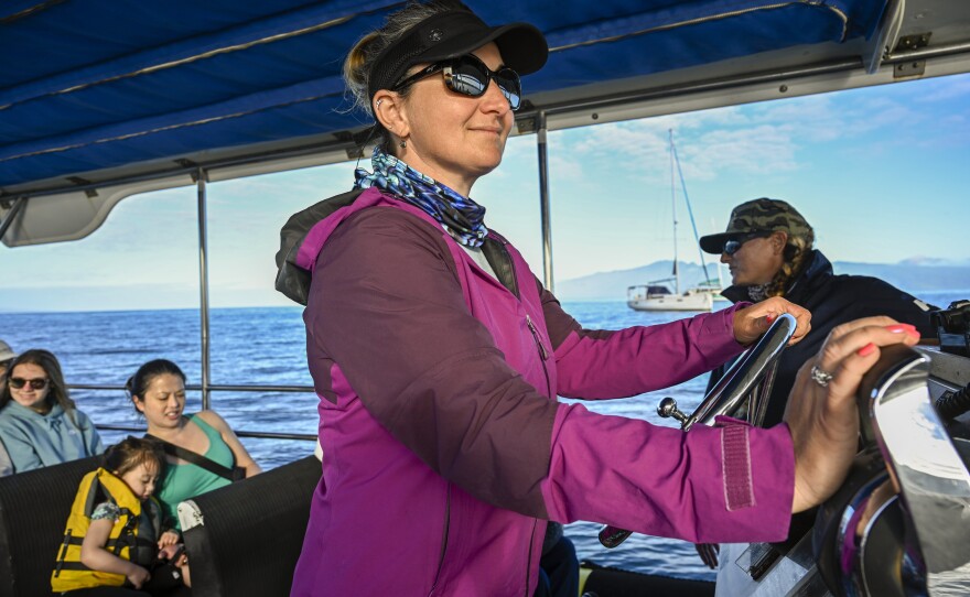 Co-captains Kristina Rau (left) and Sarah Haken (right) say being back on the water brings some normalcy to lives disrupted by the Lahaina wildfires. They ask visitors to keep the focus on the whales and not ask about their losses.