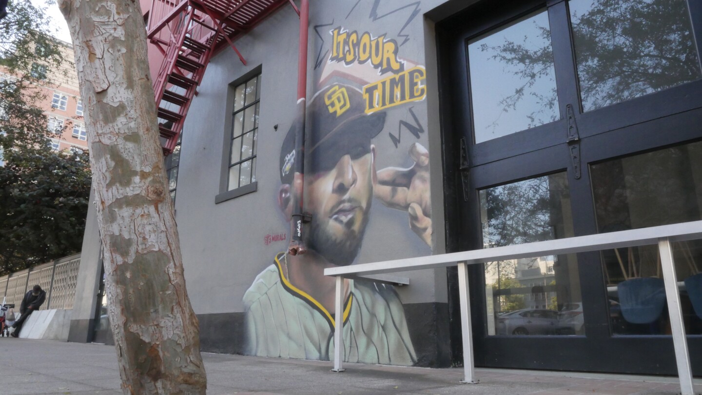 The crew at Ground Floor Murals continues to paint the town brown and gold with this mural of Joe Musgrove. Fans on their way to Petco Park can find the Padres pitcher's portrait outside the WestBrew tasting room in downtown San Diego. (Oct. 8, 2024)
