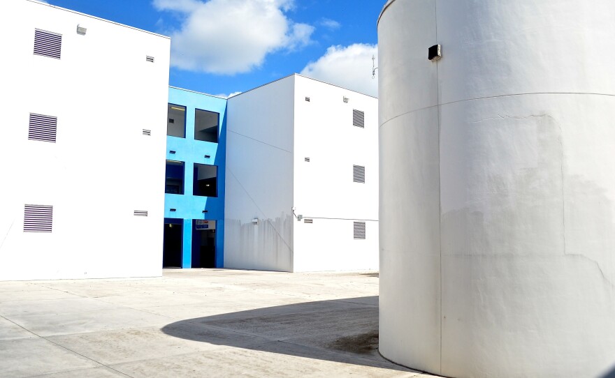 With an eye toward hurricane protection and energy efficiency, Jose de Diego, like many schools in South Florida, has few windows and large expanses of facade.