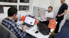 Small startup companies have an advantage, says author Eric Ries: they can test innovative ideas quickly. Here, workers in London talk at TechHub, an office space for technology entrepreneurs.