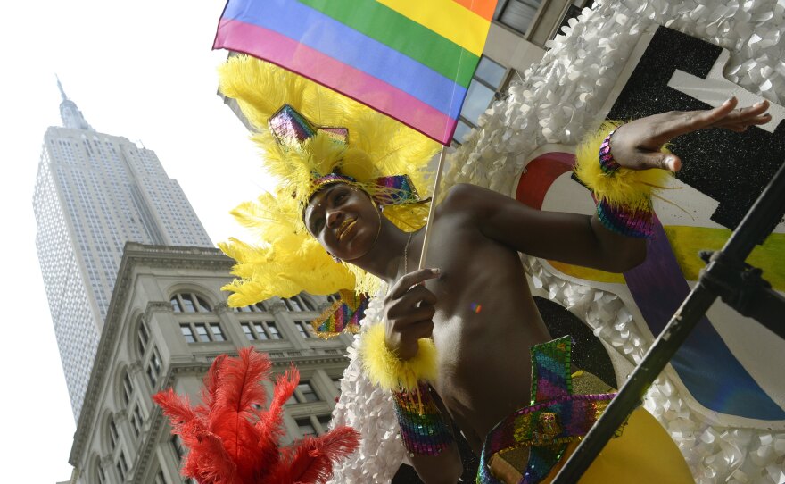 The Supreme Court on Wednesday struck down Proposition 8 and also invalidated part of a 1996 federal law that denied spousal benefits to gay couples, making New York's Pride Parade especially festive.