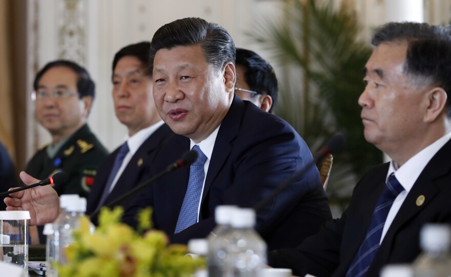 Chinese President Xi Jinping speaks during a meeting with President Trump at Mar-a-Lago resort in Florida on Friday. The U.S. missile strike in Syria added weight to Trump's suggestion he might act unilaterally against the nuclear weapons program of China's neighbor North Korea.