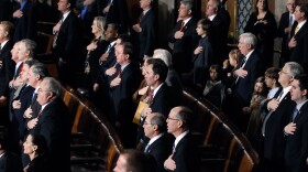 WASHINGTON, DC - JANUARY 05: Legislators say the Pledge of Allegiance prior to roll call votes on the election of the next Speaker of the House January 5, 2011 in Washington, DC.