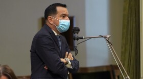 In this July 15, 2021, file photo, Assembly Speaker Anthony Rendon, D-Lakewood, wears a face mask as he addresses the Assembly in Sacramento, Calif.