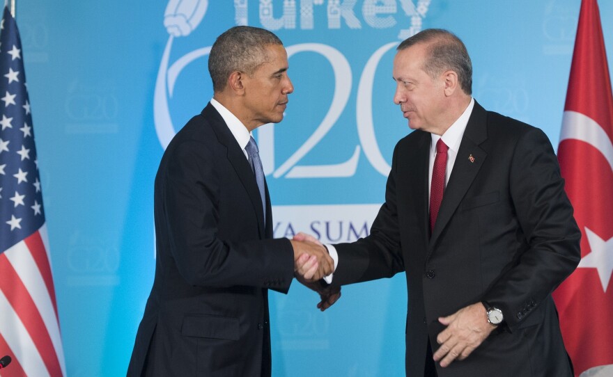 Turkish President Recep Tayyip Erdogan and President Barack Obama shake hands during a meeting on the sidelines of the G-20 summit in Antalya on Sunday.