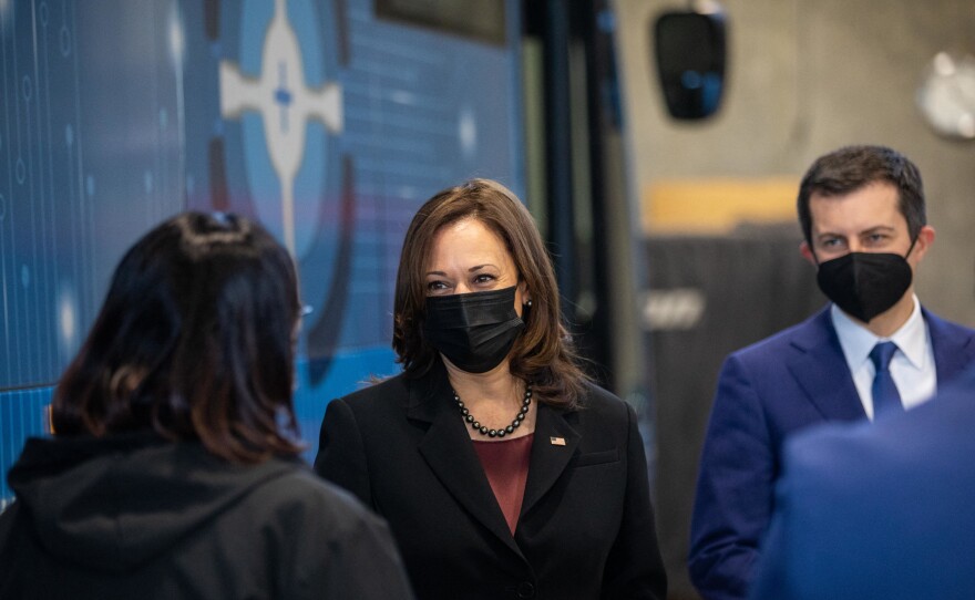 Vice President Harris and Transportation Secretary Pete Buttigieg tour electric vehicle operations at a Charlotte Area Transit System bus garage on Thursday. The two were in North Carolina to promote the new infrastructure law.