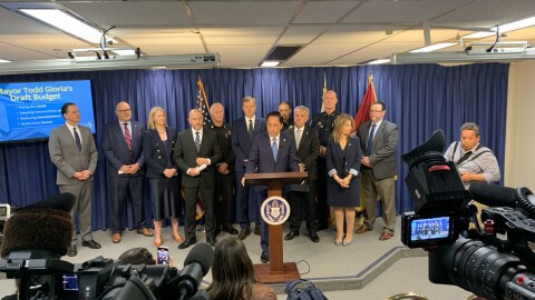 San Diego Mayor Todd Gloria is shown speaking at a news conference at San Diego City Hall on April 15, 2026.