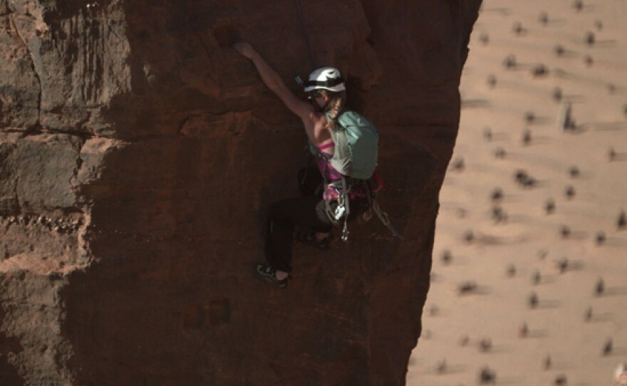 Climber Madeleine Cope scales Jebel Barkal, the sacred Kush mountain in Sudan.