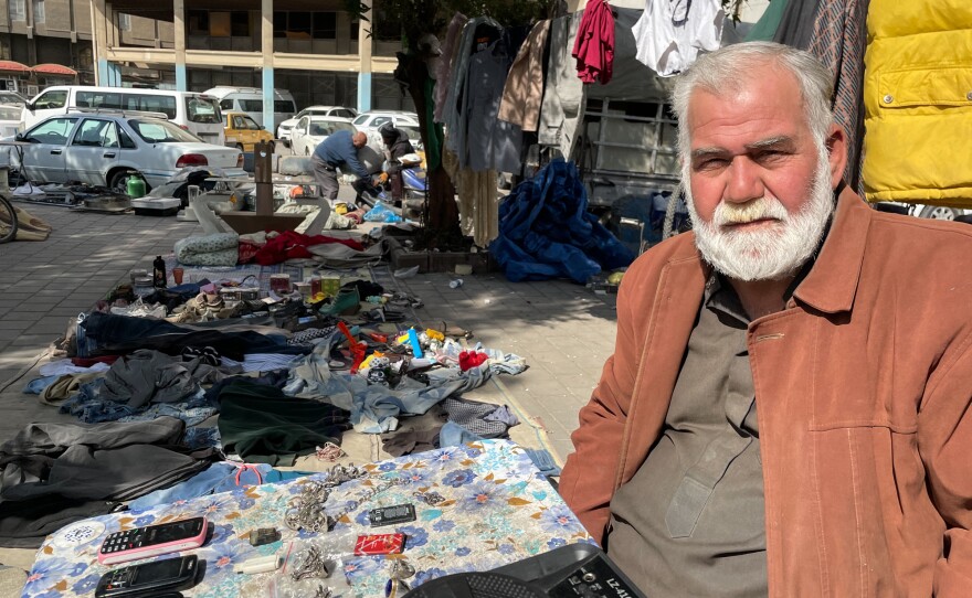 Basim Mohamed Darweesh, a Baghdad street vendor, has several old watches, some cell phones and a pile of jewelry on a folding table. He says he can no longer work at the market past noon most days even in the cooler winter months: "The midday sun makes my head boil."