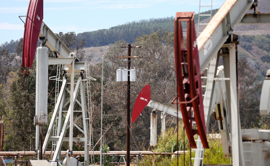 Oil pumpjacks operate near Ventura, Calif., on Aug. 5. Oil producers have ramped up output after crude prices surged this year.