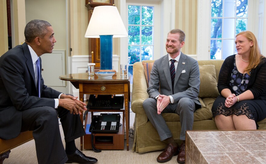 President Obama meets with Dr. Kent Brantly and his wife, Amber, during an Oval Office visit on Sept. 16.