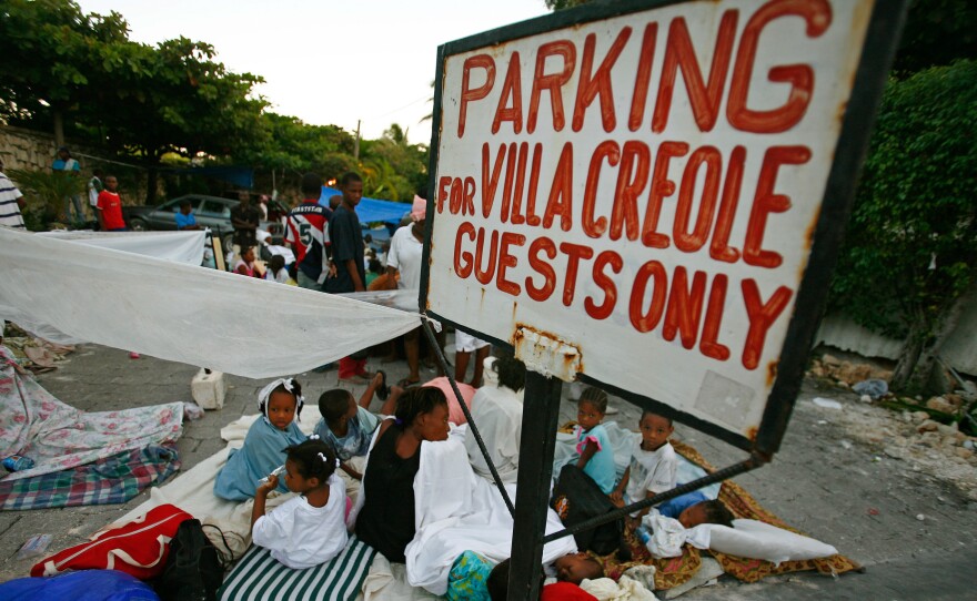 Volunteers ran a triage center for earthquake survivors at the parking lot of La Villa Creole. The photo was taken on January 14, 2010.