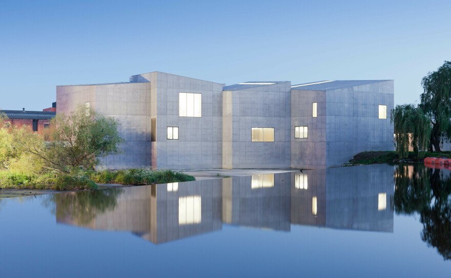The Hepworth Wakefield art museum in West Yorkshire, U.K., is situated on the River Calder and is accessible only by footbridge.