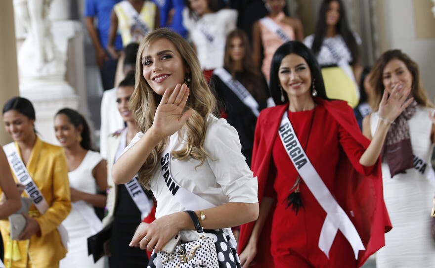 Angela Ponce, Miss Spain (center), is the first transgender contestant to compete for Miss Universe. She and other contestants are seen visiting the Government House in Bangkok last week.