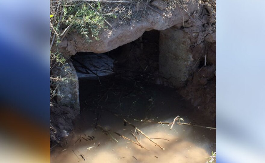 The tunnel opening was located on the south canal bank of the All-American Canal.