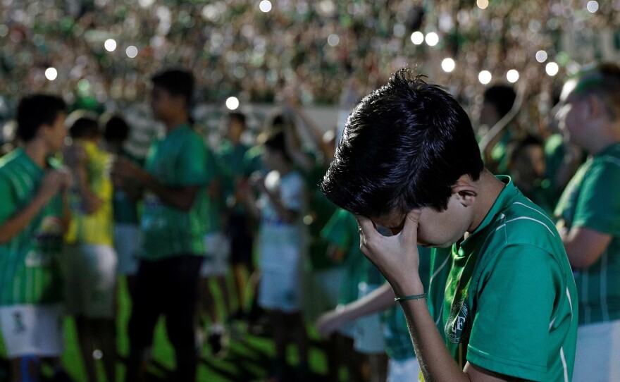 Fans of Chapecoense pay tribute to the players of the Brazilian soccer team on Wednesday.