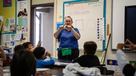 Dawn Payne, a science and music teacher at Buttonwillow Union Elementary, teaches the kindergarten class a lesson about shapes on March 27, 2023.