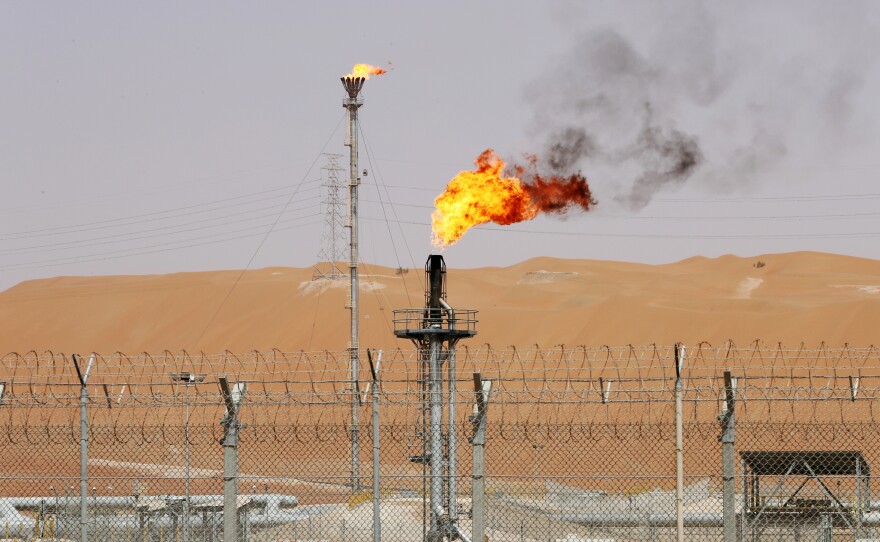 Flames are seen at the production facility of Saudi Aramco's Shaybah oilfield in May.