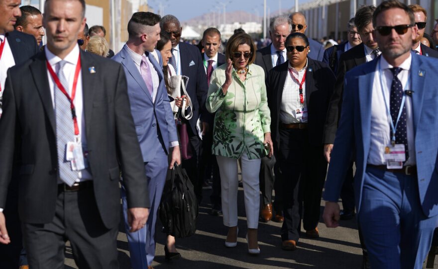 Speaker of the House Nancy Pelosi, D-Calif., walks through the COP27 U.N. Climate Summit.