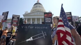 Protesters opposing vaccine mandates gather at the Capitol in Sacramento, Calif., Wednesday, Sept. 8, 2021.