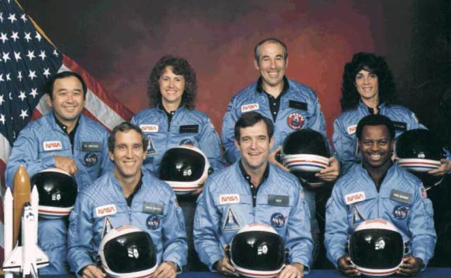 Space Shuttle Challenger crew members (Back, L-R) Mission Specialist Ellison S. Onizuka, Teacher-in-Space participant Sharon Christa McAuliffe, Payload Specialist Greg Jarvis and mission specialist Judy Resnick. (Front, L-R) Pilot Mike Smith, commander Dick Scobee and mission specialist Ron McNair.
