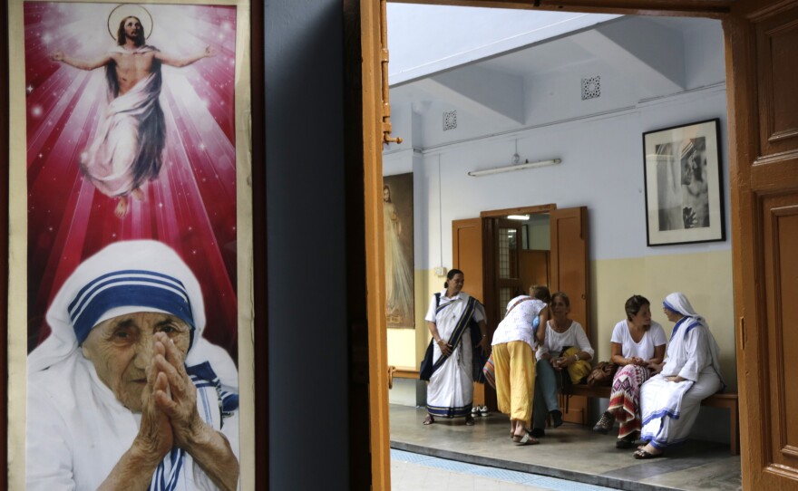 Catholic nuns attend visitors at the Missionaries of Charity house in Kolkata on Aug. 26.