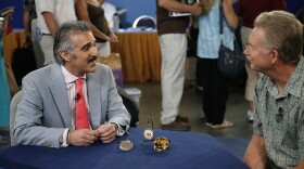 Kevin Zavian (left) appraises a George Prior triple-cased pocket watch, ca. 1810, in Louisville, Ky. ANTIQUES ROADSHOW “Vintage Louisville 2021, Hour 1” premieres Monday, March 22 at 8/7C p.m. on PBS. 
