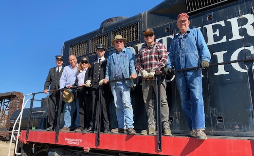 On this episode, we join host Ken Kramer (second from left flanked by train crew) aboard a vintage train through the desert backcountry of San Diego County. 