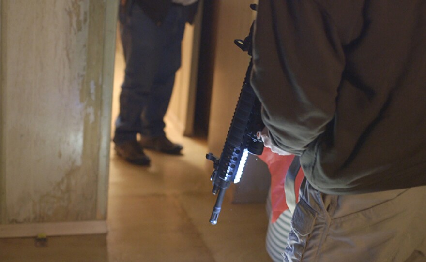 Armed occupiers explore and secure buildings at the Malheur National Wildlife Refuge headquarters in Ore.