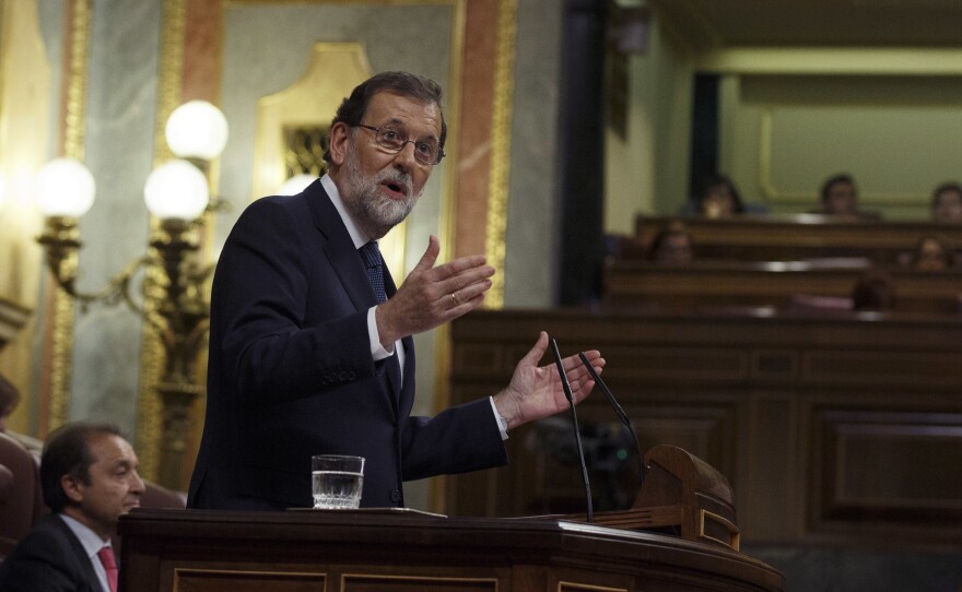 Spanish Prime Minister Mariano Rajoy speaks at the Spanish parliament in Madrid on Wednesday. Rajoy has asked Catalan leader Carles Puigdemont to confirm whether he has declared independence.