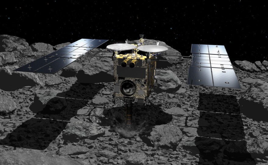 Japan's Hayabusa2, seen in this illustration, has been probing the asteroid Ryugu since 2018. The spacecraft is collecting samples that will be returned to Earth.